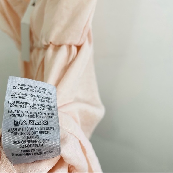 Satin pink ruffle teddy romper - Picture 4 of 8